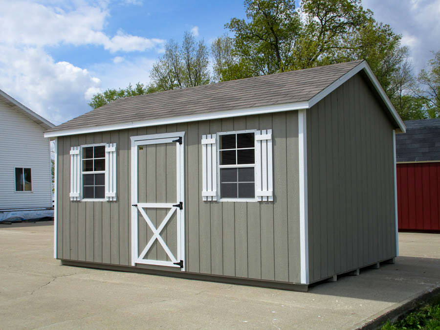 Gray A-frame shed with white trim
