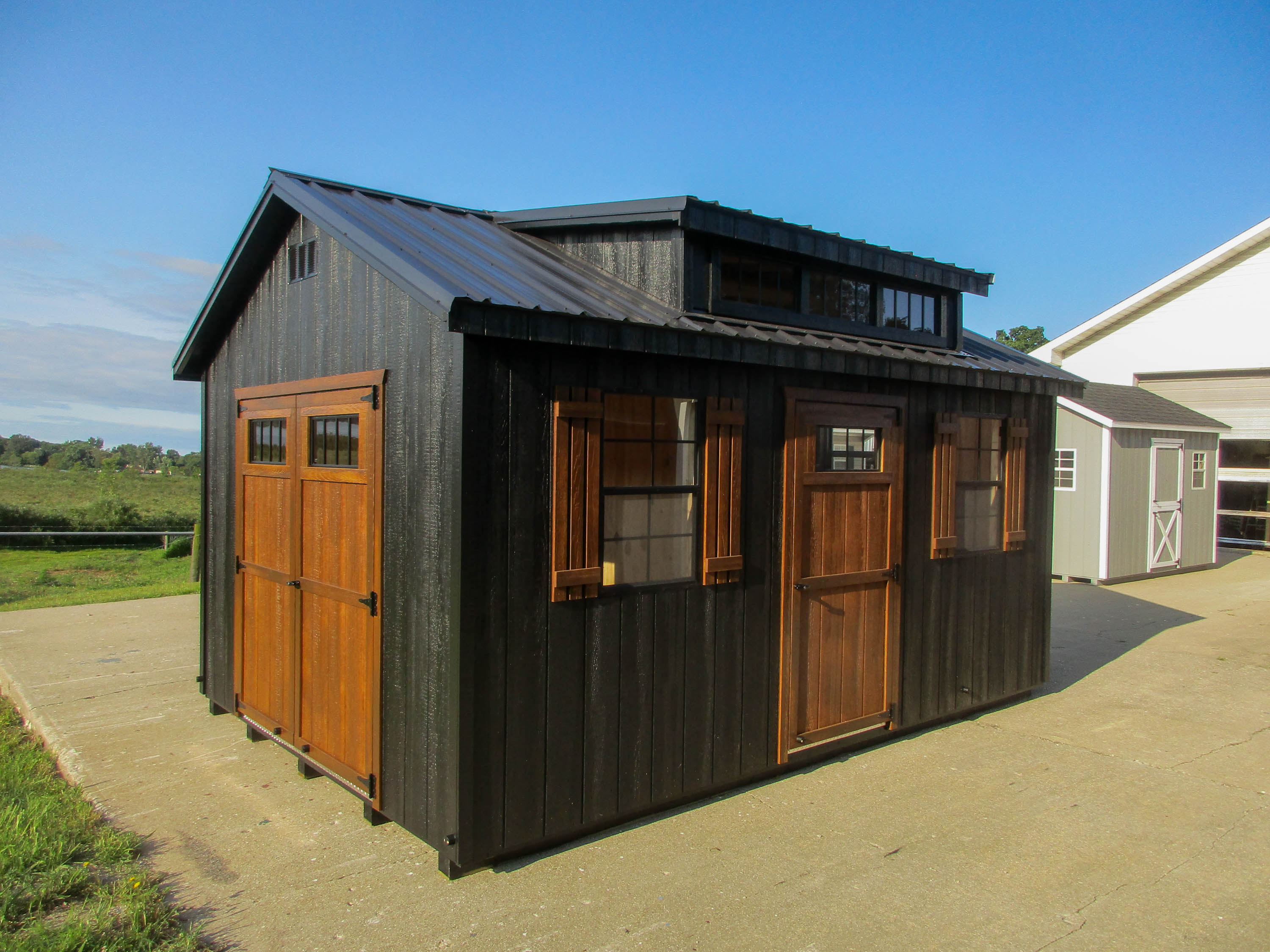 Cape Cod Shed with a symmetrical, residential-inspired front