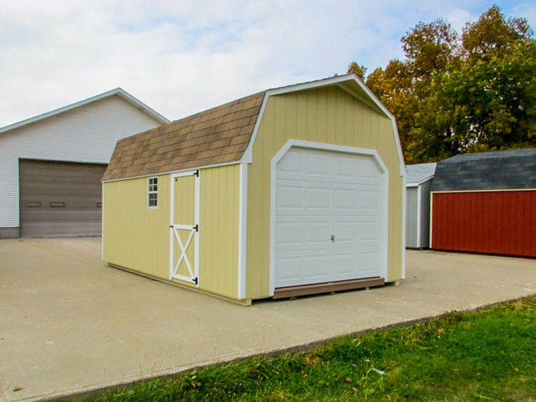 Finished Gambrel garage positioned on a property