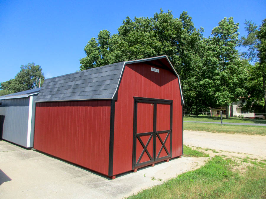 Compact Mini Barn with double doors and contrasting trim