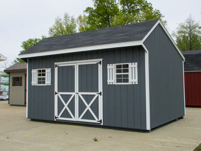 Quaker barn with warm siding and contrasting trim